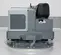 Gray Nilfisk ride-on scrubber