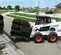 White, black and red Bobcat Skid Steer